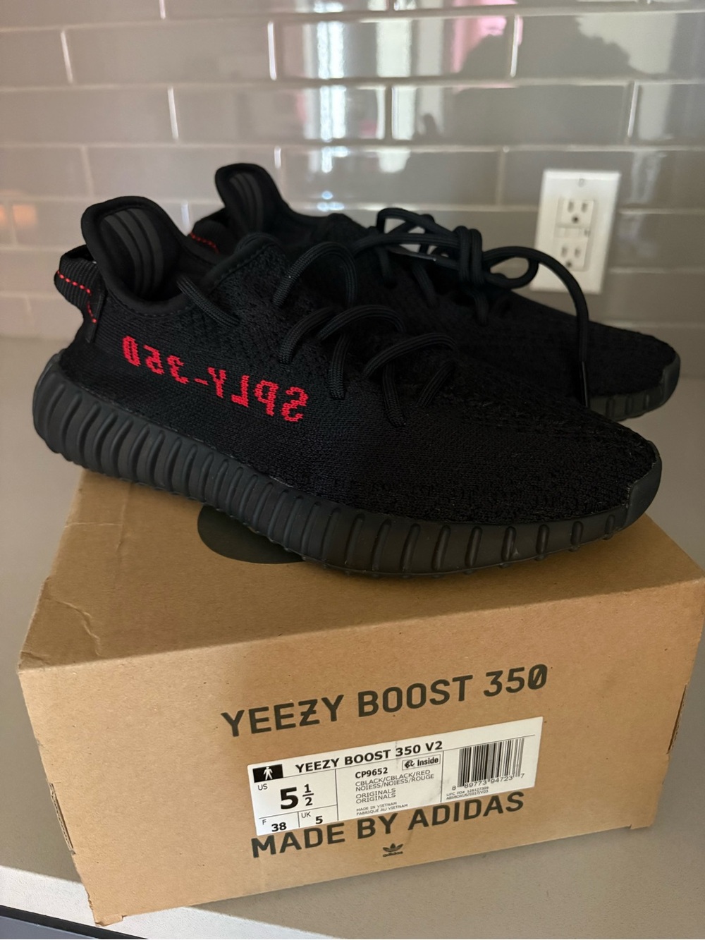 Yeezy Boost 350 V2 Black with Red Accent Sneakers